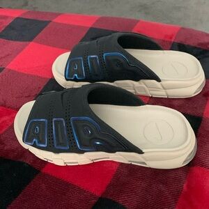 Nike uptempo slides worn around me the house once.